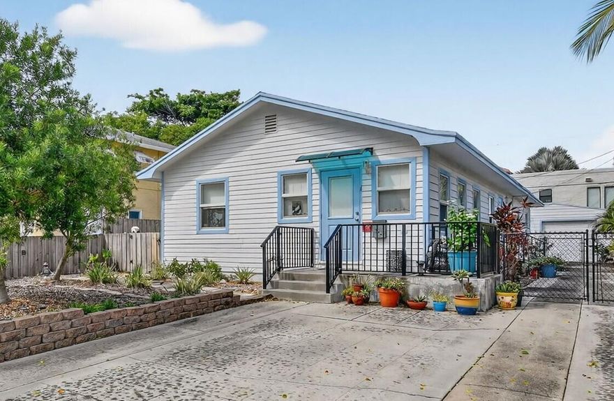 Step back in time with modern comforts! This stunning bungalow home is nestled in the heart of Flamingo Park, one of West Palm Beach's most coveted historic districts. This 2-bedroom, 2-bathroom home masterfully blends historic charm with high-end updates.Enjoy the security of full impact window and door protection, and completely renovated kitchens and bathrooms. The kitchen boasts stainless steel appliances and granite countertops, while the interiors feature charming shiplap ceilings. The property includes a long driveway for extra parking, a fully fenced yard for your furry friends and a detached garage that is perfect for conversion into an accessory dwelling unit or additional living space.Live steps away from downtown, the Kravis Center, beaches, and