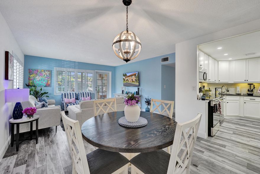 Welcome to this beautifully renovated corner unit in the highly coveted Manor Grove Phase 4, just a few blocks from Wilton Drive with all the restaurants, bars, and nightlife. Offering 2 large bedrooms, 2 bathrooms, and 1,180 sqft, this bright and airy residence is filled with natural light thanks to its prime corner location. The home features hurricane impact windows and doors, new flooring, and fully updated bathrooms, blending comfort with modern style. Enjoy relaxing on the screened-in porch overlooking the beautiful courtyard. Residents enjoy resort-style amenities including a waterfront pool, tennis and pickleball courts, and a clubhouse. With ample guest parking and a peaceful community setting, this is South Florida living at its best. GPS