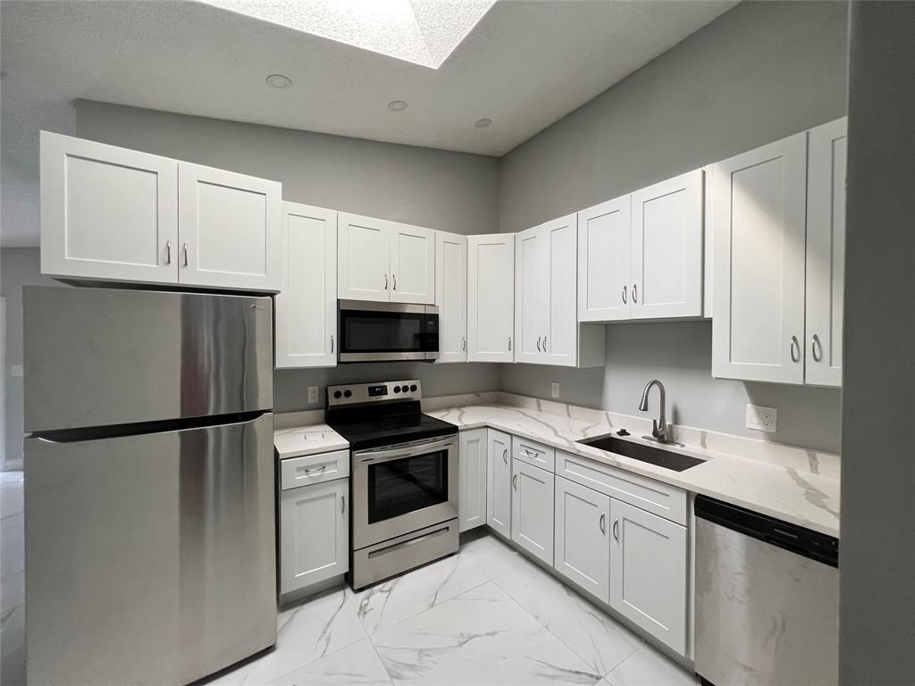 Photo of 4371 NW 80th Avenue #B, Coral Springs, FL 33065 (MLS # F10507458)