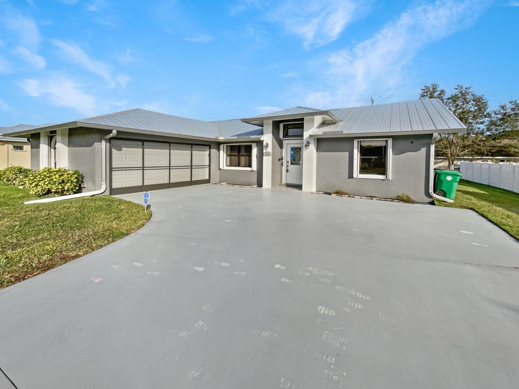 Photo of 473 SW Homeland Road, Port Saint Lucie, FL 34953 (MLS # R10949216)