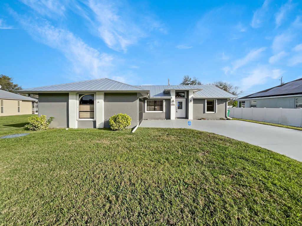 Photo of 473 SW Homeland Road, Port Saint Lucie, FL 34953 (MLS # R10949216)