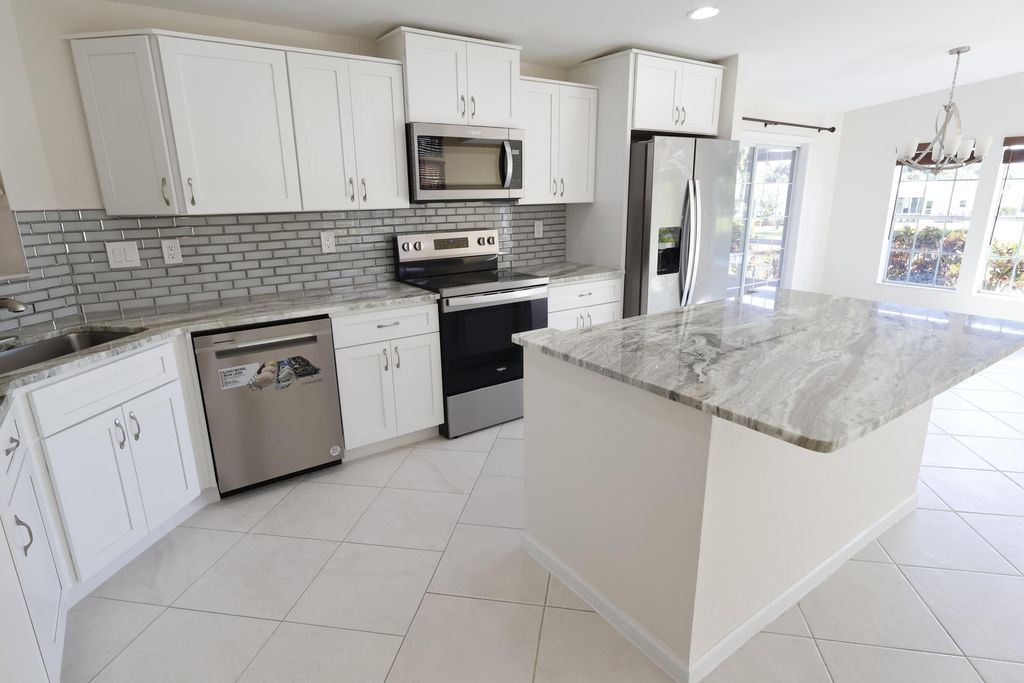 Photo of 7654 Eastern Bluebird Drive, Port Saint Lucie, FL 34952 (MLS # R11158579)