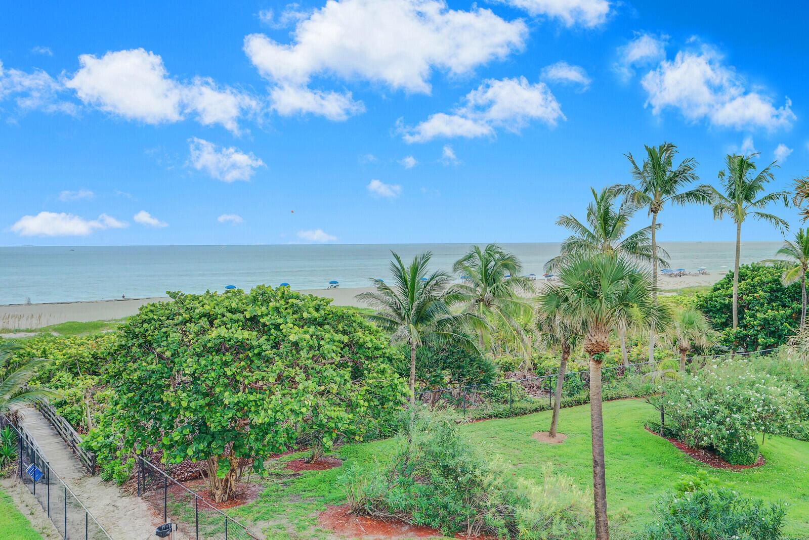 ON THE BEACH! THIS IS AN UNIQUE BEACH GETAWAY THAT IS FULLY RENOVATED WITH A MILLION DOLLAR VIEW DOWN THE SINGER ISLAND SHORE LINE. Villas on the Ocean has kept the old Florida charm. One of the few remaining low rises directly on the beach and this is a premier unit on the top floor. Elevator service to the 4th Floor right next to the unit.