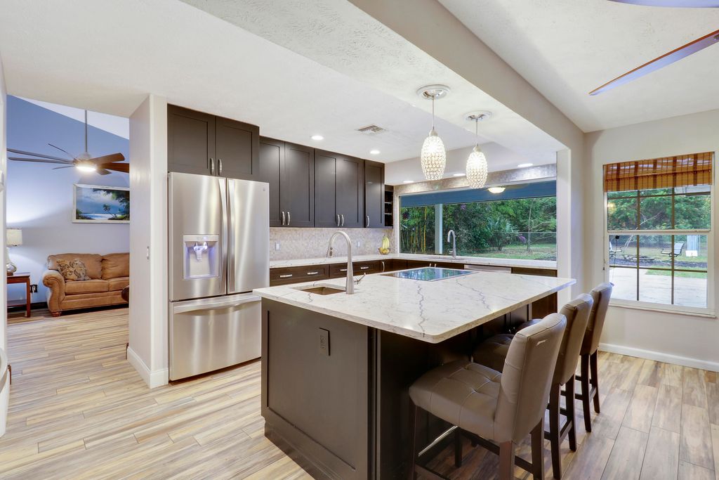Photo of 4360 SE Kubin Avenue, Stuart, FL 34997 (MLS # R11055483)