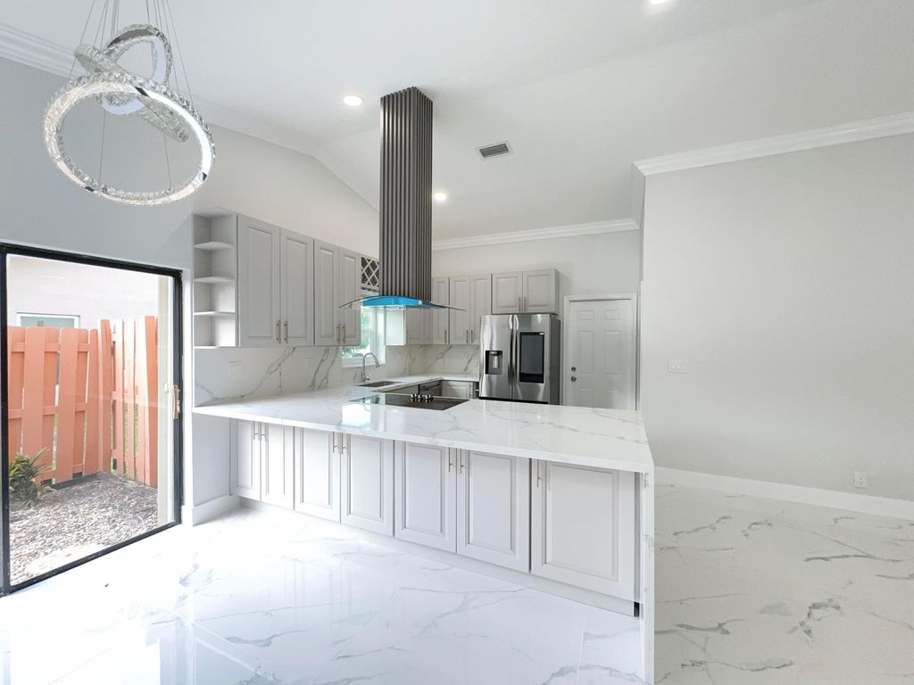Photo of 20870 Sugarloaf Lane, Boca Raton, FL 33428 (MLS # R11002558)