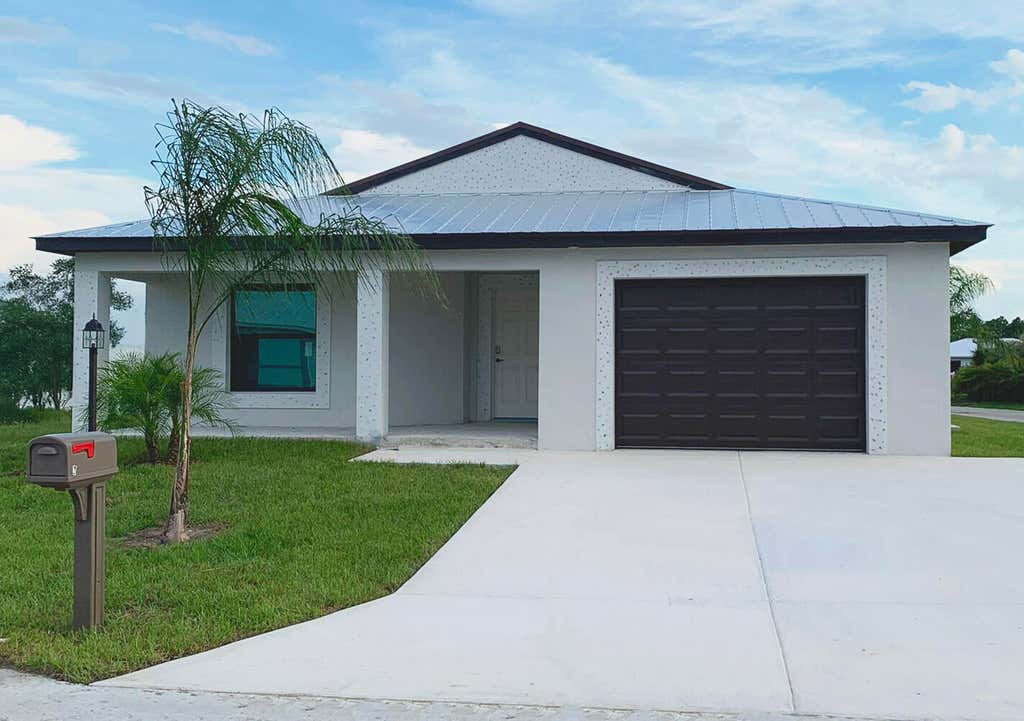 Photo of 10 San Juan Lane, Port Saint Lucie, FL 34952 (MLS # B26067892)
