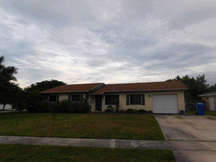 Don't miss out on this great deal for this bank owned foreclosure. 3 bedrooms, 2 baths, tiled floors, fenced, corner lot, 1 car garage. newer kitchen, central a/c