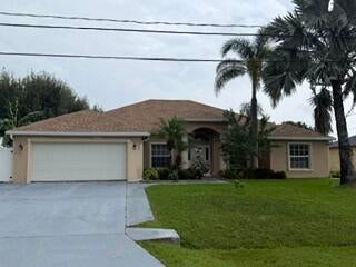 Photo of 2291 SW ALMANSA Avenue, Port Saint Lucie, FL 34953 (MLS # B26079816)