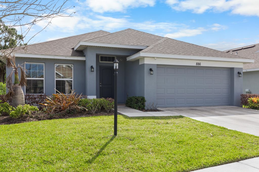 Photo of 886 NE Whistling Duck Way, Port Saint Lucie, FL 34983 (MLS # B26020180)