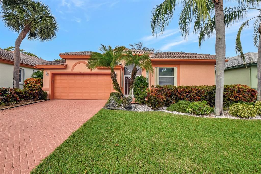 Photo of 5659 Swaying Palm Lane, Boynton Beach, FL 33437 (MLS # R10853712)