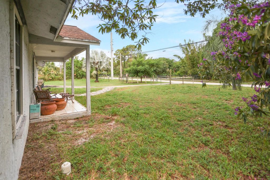 Photo of 18055 W Sycamore Drive, The Acreage, FL 33470 (MLS # R11114660)