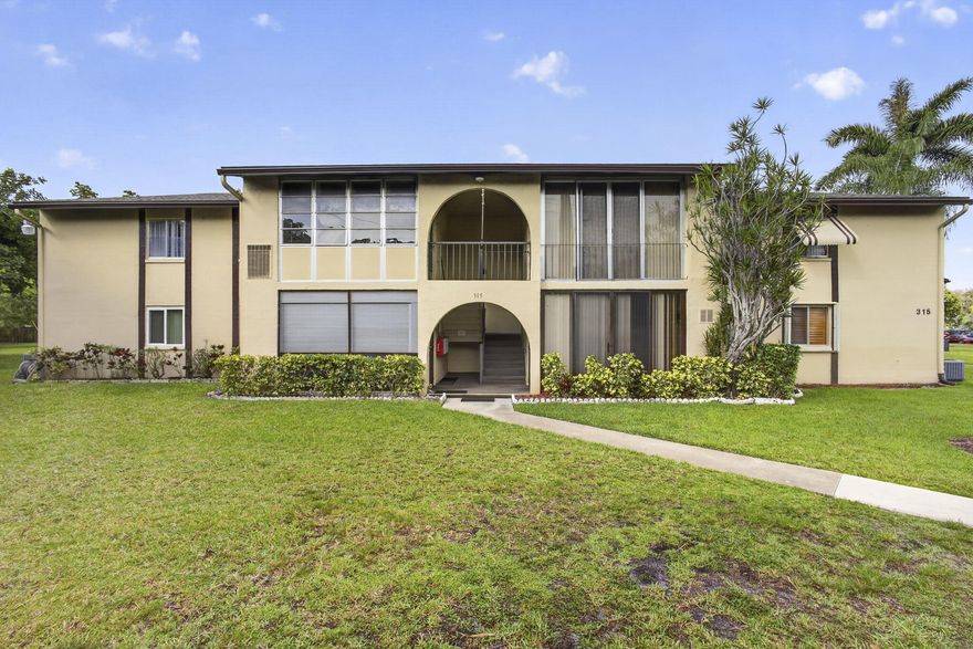Welcome to Pine Ridge III, a vibrant 55+ no-pet community. Residents enjoy a clubhouse, sparkling pool, shuffleboard, bocce, and pickleball courts, with a scenic lake, complete with a walking trail. This updated 2-bed 1-bath first-floor corner unit offering comfort, style, and convenience. This move-in ready condo features a 2018 A/C system, updated kitchen cabinets and countertops, Whirlpool dishwasher, and garbage disposal. Interior upgrades include updated flooring throughout and fresh paint in every room. The remodeled bathroom showcases an updated vanity, toilet, and a tiled walk-in shower with elegant glass door and floor-to-ceiling tile finishes. Enjoy the charm of Bahama shutters. Ideal first-floor location with corner-unit privacy and easy access.