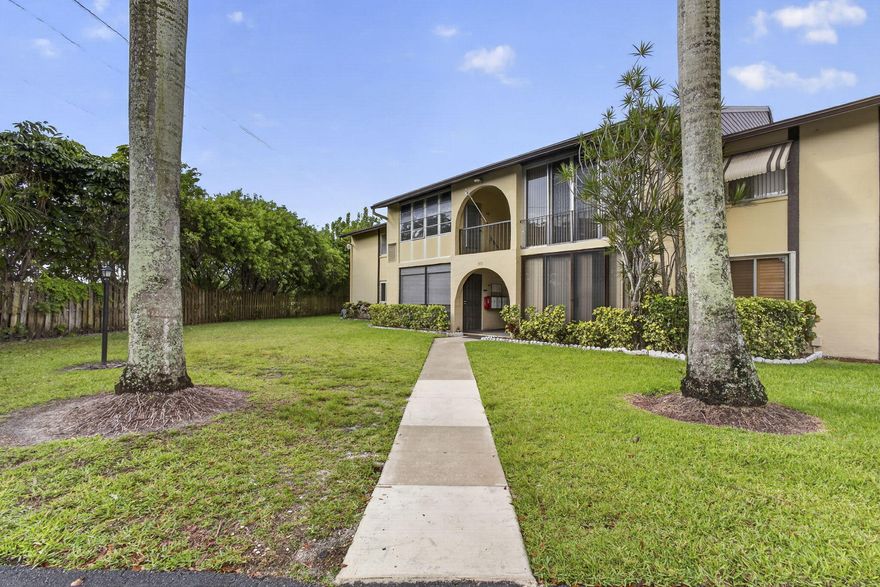 Welcome to Pine Ridge III, a vibrant 55+ no-pet community. Residents enjoy a clubhouse, sparkling pool, shuffleboard, bocce, and pickleball courts, with a scenic lake, complete with a walking trail. This updated 2-bed 1-bath first-floor corner unit offering comfort, style, and convenience. This move-in ready condo features a 2018 A/C system, updated kitchen cabinets and countertops, Whirlpool dishwasher, and garbage disposal. Interior upgrades include updated flooring throughout and fresh paint in every room. The remodeled bathroom showcases an updated vanity, toilet, and a tiled walk-in shower with elegant glass door and floor-to-ceiling tile finishes. Enjoy the charm of Bahama shutters. Ideal first-floor location with corner-unit privacy and easy access.