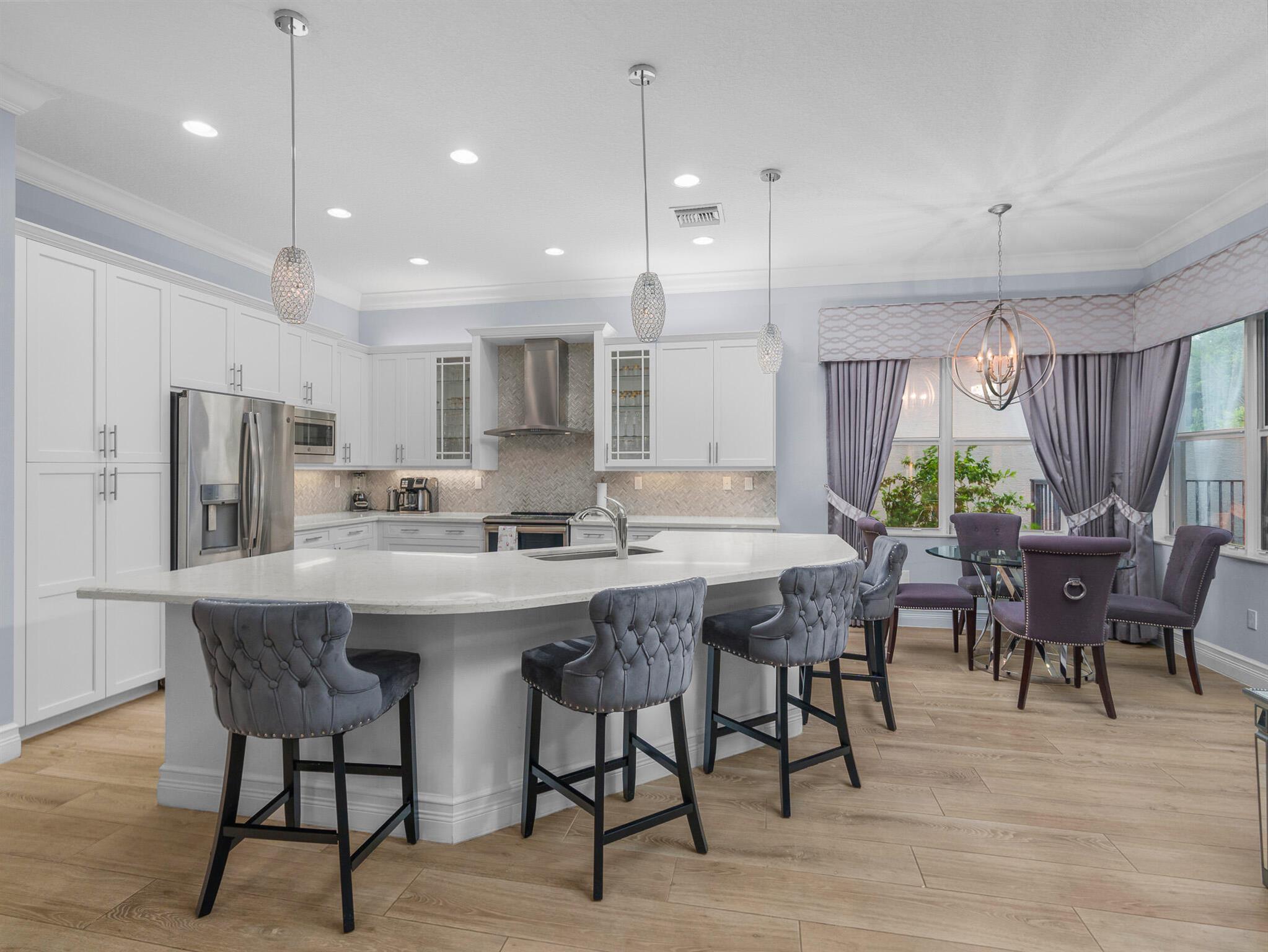 This beautiful custom home is 3 bedroom 3 full bath + Den or 4th bedroom, 2 car garage, The Bimini model sits on a private lot. Includes impact windows, open floor plan, all custom floors, recessed lights with custom light package and custom trim package . The gourmet kitchen w quartz countertops, custom backsplash, built-in pantry cabinet, stainless steel appliances and under cabinet lighting. Breakfast area, dining room is like new. The home is being sold as furnished with TVs and all appliances. TV on Patio, heated pool. New ultra quiet generator with buried LP Tank. Sleep number bed in master bedroom. Screened Patio and fenced yard. HOA provides Lawn, all garden maintenance, sprinklers basic cable, clubhouse, painting house, cleaning ,driveway Motivated​​‌​​​​‌​‌​​​‌‌​​​‌‌‌​​‌​​‌‌​​​​ seller