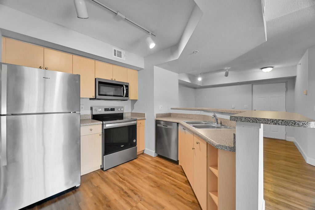 Photo of 3740 NW Adriatic Lane #305, Jensen Beach, FL 34957 (MLS # B26051216)
