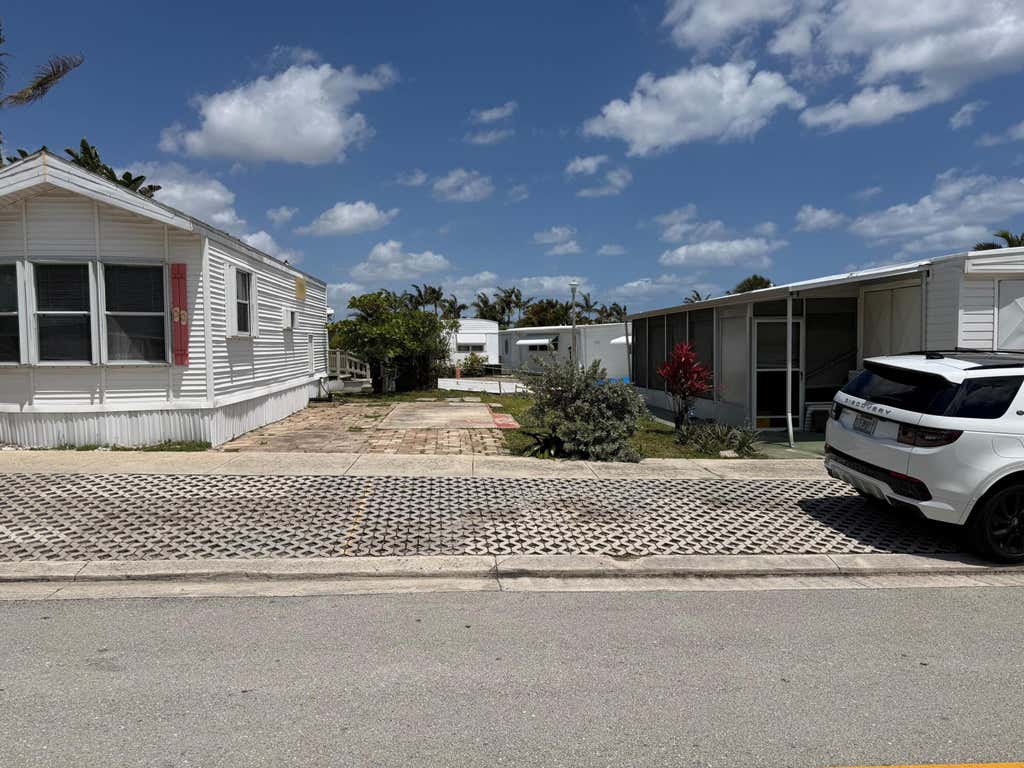 Photo of 23 Briny Breezes Boulevard, Briny Breezes, FL 33435 (MLS # B26068779)