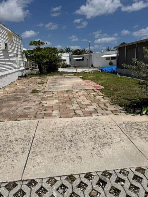 Photo of 23 Briny Breezes Boulevard, Briny Breezes, FL 33435 (MLS # B26068779)