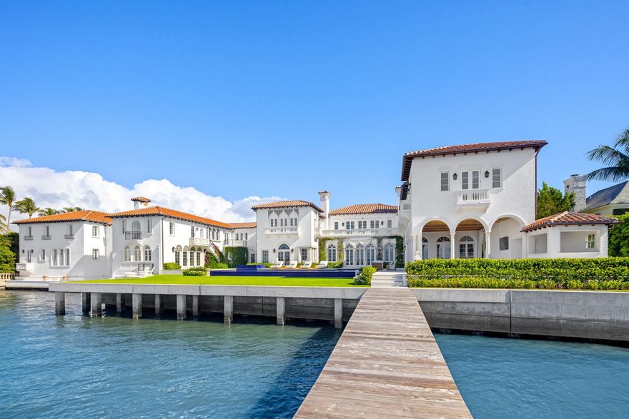 Introducing ''Casa del Ensuenos'', one of the most iconic renovations in Palm Beach history. This is truly a one-of-one, legacy opportunity in South Florida and an extraordinarily rare chance to own a completely gut-renovated piece of landmarked history along the Palm Beach island waterfront. Located ideally in the Estate Section and just minutes from global luxury destinations like Worth Avenue, Mar-a-Lago, and the growing presence of ''Wall Street South'' in downtown West Palm Beach, this generational slice of paradise just completed a multi-year reimagination, turning this historic Mizner into a contemporary marvel with all of the modern conveniences. With the newly finished reconstruction yet to be resided in, few (if any) compounds of this magnitude and quality exist in such a prime South Florida location as this. Sitting on a nearly 1.5-acre direct waterfront lot along the Intracoastal with 200 feet of frontage, this gated estate features a sprawling 15 bedrooms and 18 full bathrooms spread out amongst an expansive 27,000 +- total square feet of elite Palm Beach living, alongside a private, sunken, red clay tennis court. The home consists of a main house, boat house, tennis pavilion, and a six-car garage. Other not-to-be-missed bespoke amenities of this trophy residence include an expansive covered loggia, a full performing arts theatre with stage, chef's kitchen, comprehensive security camera system, a new seawall, generator, elevator, exquisite exterior landscape lighting, eight fireplaces, and a heated infinity pool with swim-resistance jets. Perfectly positioned directly on the Intracoastal waterway and looking out towards the private docks with a 40,000 lb boat lift, this uniquely elegant residence is a perfect blend between accessibility to the quaint, charming Town of Palm Beach as well as proximity to the bustling downtown of West Palm Beach. Enjoy sunsets from the seclusion of this prestigious, western-facing, and sublimely executed Venetian-style Palm Beach resort masterpiece, complete with beach access just a few steps away. Staging and furnishings by Vesta Home; all furniture available for purchase.


DISCLAIMER: Information published or otherwise provided by the listing company and its representatives including but not limited to prices, measurements, square footages, lot sizes, calculations, statistics, and videos are deemed reliable but are not guaranteed and are subject to errors, omissions or changes without notice. All such information should be independently verified by any prospective purchaser or seller. Parties should perform their own due diligence to verify such information prior to a sale or listing. Listing company expressly disclaims any warranty or representation regarding such information. Prices published are either list price, sold price, and/or last asking price. The listing company participates in the Multiple Listing Service and IDX. The properties published as listed and sold are not necessarily exclusive to listing company and may be listed or have sold with other members of the Multiple Listing Service. Transactions where listing company represented both buyers and sellers are calculated as two sales. "No payments made until title passes" Some affiliations may not be applicable to certain geographic areas. If your property is currently listed with another broker, please disregard any solicitation for services. Information published or otherwise provided by seller, listing company or its representatives is deemed reliable but are not guaranteed and subject to errors, omissions, or changes without notice. Copyright 2026 by the listing company. All Rights Reserved.