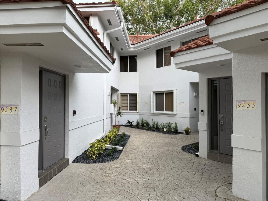 This 2-bedroom, 2-bath townhouse offers modern upgrades, vaulted ceilings up to 13 ft and serene PRIVATE canal views in a lush community. This well-maintained neighborhood of 205 units features a pool, lounge area, and walking paths for pets. The home includes a freshly painted ground-floor garage with stairs leading to the living area, an updated private balcony, NEW knockdown ceilings (no popcorn), wood floors, large tiles in the kitchen, granite counters, NEW Samsung stainless appliances, and soft-close cabinets. Smart features include an Alexa-compatible patio light and patio fan plus the garage door opener. NEW A/C, NEW updated PEX plumbing, and a NEW garage door opener providing comfort and efficiency. Appliances approx. 3 years old (Samsung stainless steel). A/C approx. 1.5 years old. Plumbing updated with PEX approx. 3.5 years ago. Brand new garage door opener. All ceiling fans and light fixtures have been replaced. Interior freshly painted; ceilings updated from popcorn to knockdown. Lots of new additions for a 30+ year old home!