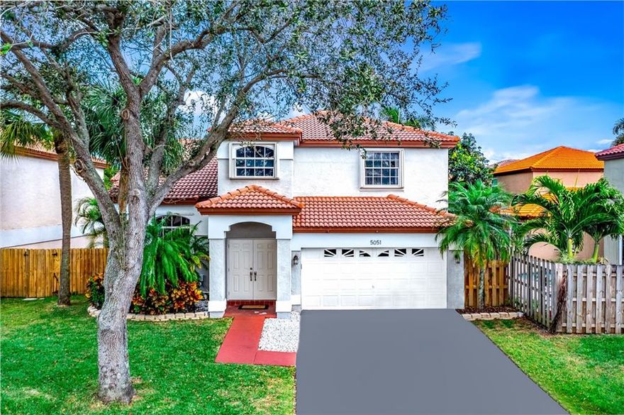 This beautiful 4 bed 2.5 bath two-story pool home is located right off of the Sawgrass Expressway on the outskirts of Coconut Creek in a gated community. Home features a 2 car garage, ample storage, hurricane doors (2022), brand new driveway (2021), fully fenced in backyard with updated pool decking (2019), upgraded kitchen, plus so much more. The kitchen has ample room, a pantry, and a view of the backyard. The dining area features a sliding glass-door bringing you access to the backyard. All bedrooms include closets, the master bedroom has a large walk-in closet. Tile flooring throughout the first floor with laminate and carpet upstairs. Very quiet neighborhood in a great school district. Close to grocery stores, shopping, restaurants, and major highways.