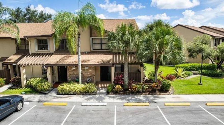 Corner Townhome Lake View*Immaculate Clean & Perfectly Maintained & Loved by Original Owner*Light & Bright* TONS of Guest parking! 3 spacious Bedrooms*2 bathroom upstairs*Half bath downstairs*New Kitchen with white shaker cabinets* Stainless Steel appliances, French door fridge & 5 Burner Electric Range*Fenced Courtyard off kitchen*Storage Room*Glass Enclosed patio w/Lake View*Full size Washer/ Dryer*Full Accordion HURRICANE SHUTTERS *Recessed lighting*4 Ceiling fans* Roof 2021*Tile throughout except stairs*Ideal Location close to all major highways, Shopping, Casinos, Restaurants *Heated Olympic style pool w/jacuzzi, saunas, kiddie pool & MORE*Easy walk to Karanda 3 pool* 3 Playgrounds*Kids Activities*Amenities for all ages*Good credit and income required*