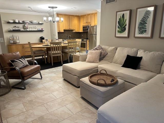 LOCATION! Your own private oasis! Perfectly located hidden gem. Rare 2/2 corner unit on first floor surrounded by lawn area. Updated open kitchen. Stainless appliances. Porcelain tile throughout. Crown molding. Walk in pantry for storage/kayaks. Washer/Dryer in unit. Impact windows. Plantation shutters in bedrooms. Dedicated parking is first spot in front of unit. Located on canal with fixed bridges and ocean access. Dockage available at $1,719/year. Amenities include pool, fitness center, clubhouse and kitchen, BBQ, sauna, kayak/canoe launch, gazebo and billiard room. Pets under 20lbs permitted. New roof and updated hallways. 700 credit score required. All or partial furniture can be included for a cost. Information herein is deemed reliable and subject to errors.