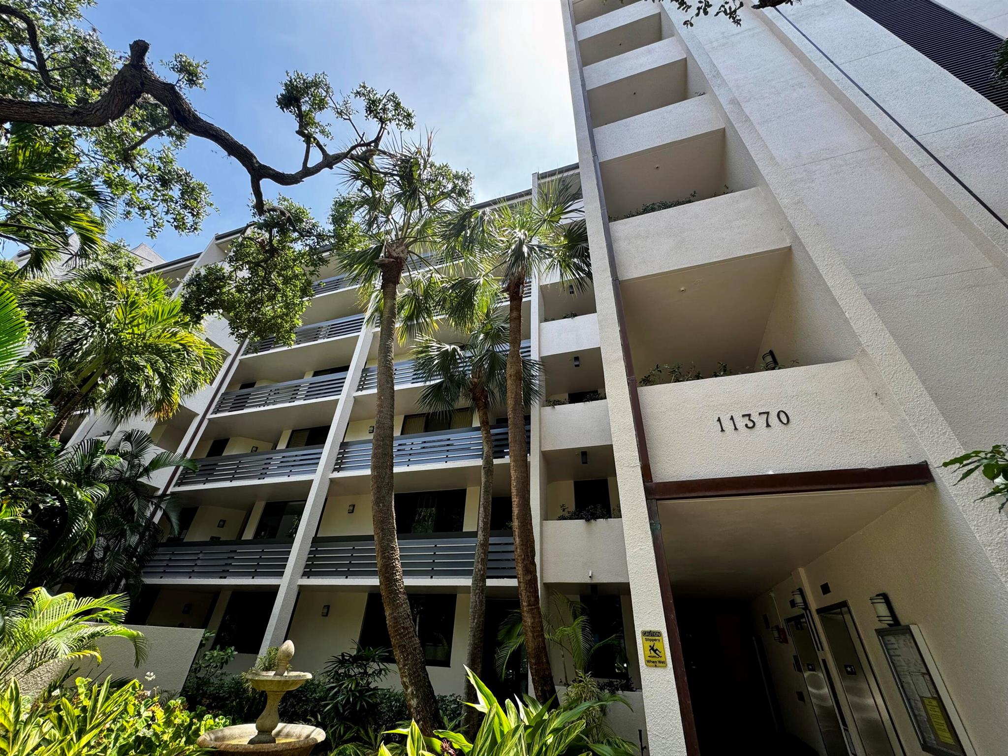 Waterfront condo for sale in the sought-after 12 Oaks community of North Palm Beach. This updated 4th-floor unit features wood floors, in-unit laundry, and two private balconies with breathtaking views of passing boats. Includes a covered parking spot in a gated, all-age community with elevators, a resort-style pool, and on-site amenities. Peaceful setting with mature oaks, walking distance to Publix, shops, and dining, and just 5 minutes to the Gardens Mall. ALSO FOR RENT!