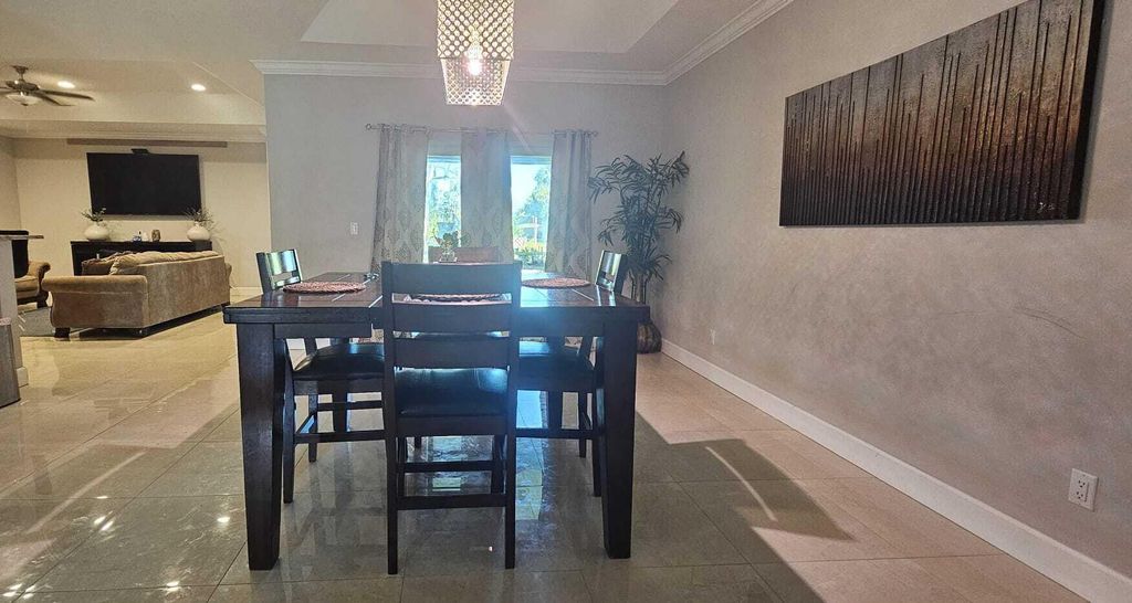 Photo of 3611 SW Europe Street, Port Saint Lucie, FL 34953 (MLS # R10973271)