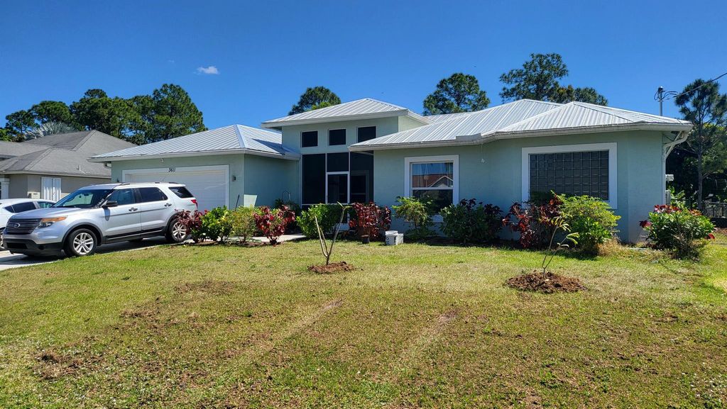Photo of 3611 SW Europe Street, Port Saint Lucie, FL 34953 (MLS # R10973271)
