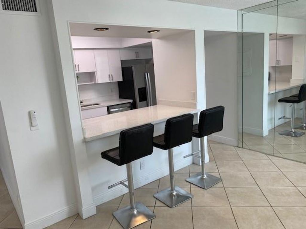 Photo of 9440 Live Oak Pl #307, Davie, FL 33324 (MLS # F10531805)