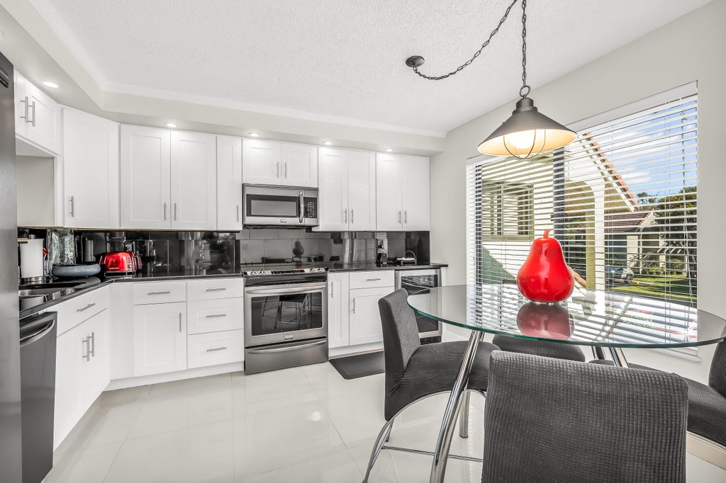 Photo of 5757 Fairway Park Court #202, Boynton Beach, FL 33437 (MLS # R11104927)