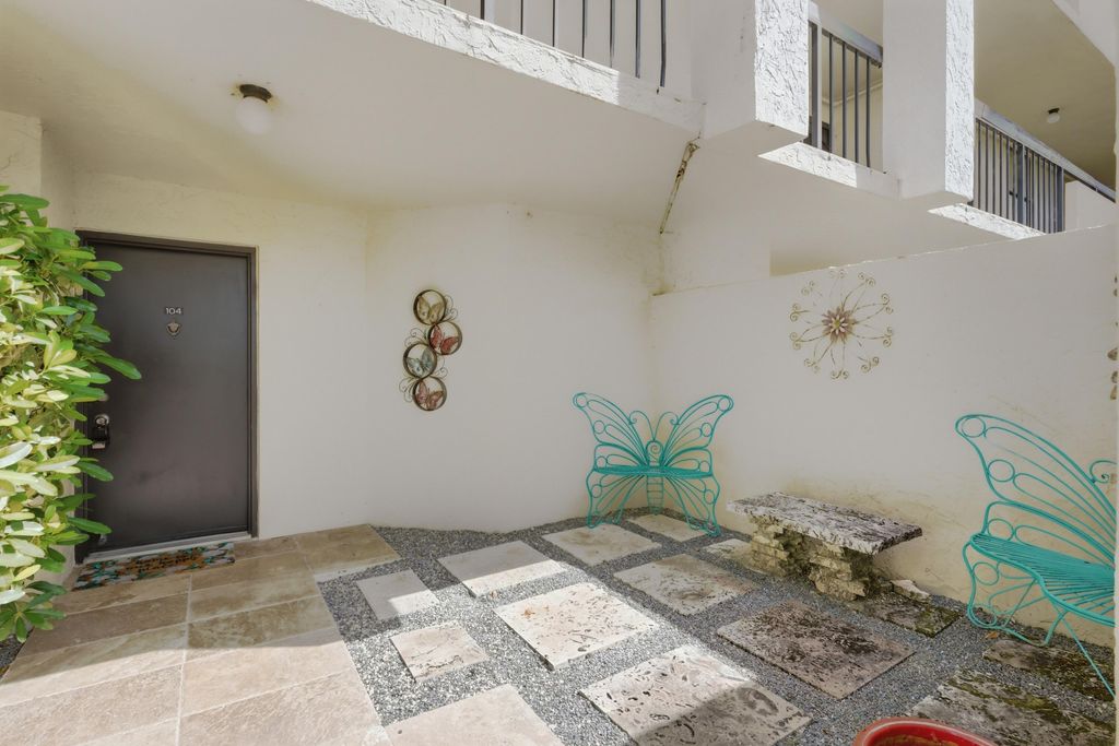 Photo of 825 Egret Circle #104, Delray Beach, FL 33444 (MLS # B26031900)