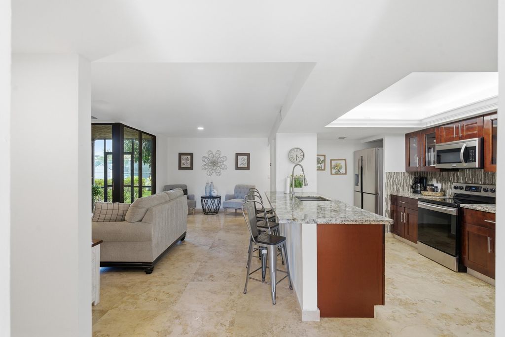Photo of 825 Egret Circle #104, Delray Beach, FL 33444 (MLS # B26031900)