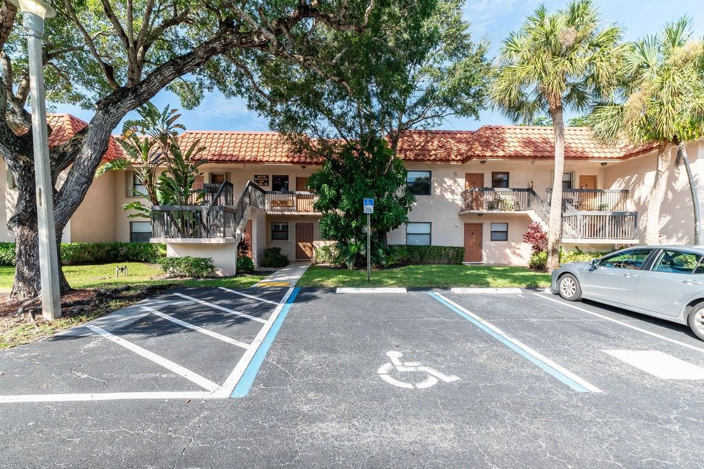 Photo of 15718 E Waterside Circle #103, Sunrise, FL 33326 (MLS # F10467659)