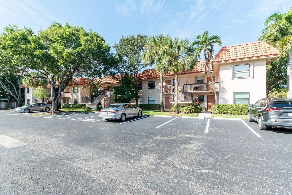Photo of 15718 E Waterside Circle #103, Sunrise, FL 33326 (MLS # F10467659)