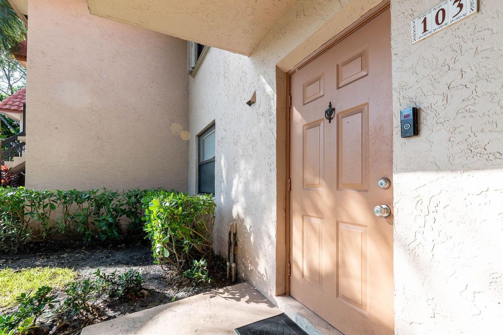 Photo of 15718 E Waterside Circle #103, Sunrise, FL 33326 (MLS # F10467659)