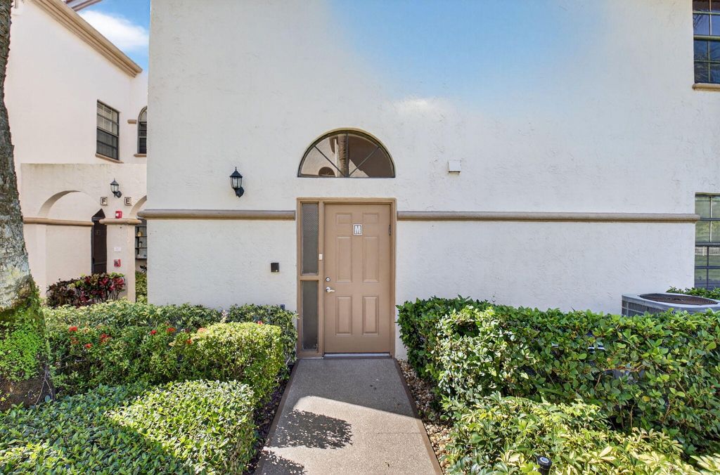 Photo of 5203 Europa Drive #M, Boynton Beach, FL 33437 (MLS # R11138405)