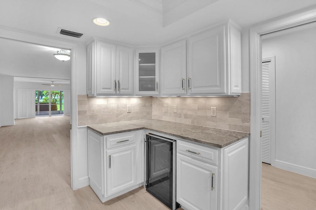 Photo of 145 Atlantis Boulevard #104, Atlantis, FL 33462 (MLS # R11131835)