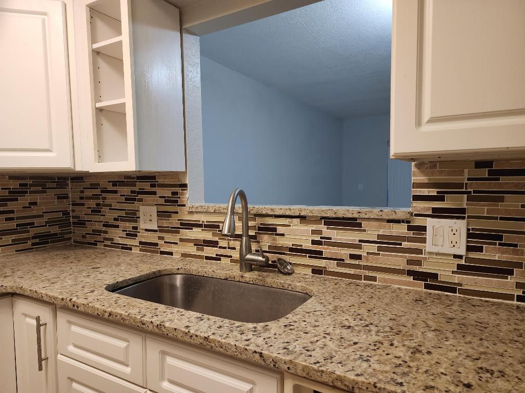 WOODLANDS CONDOMINIUM APARTMENT BUILDING 1 - Residential Lease