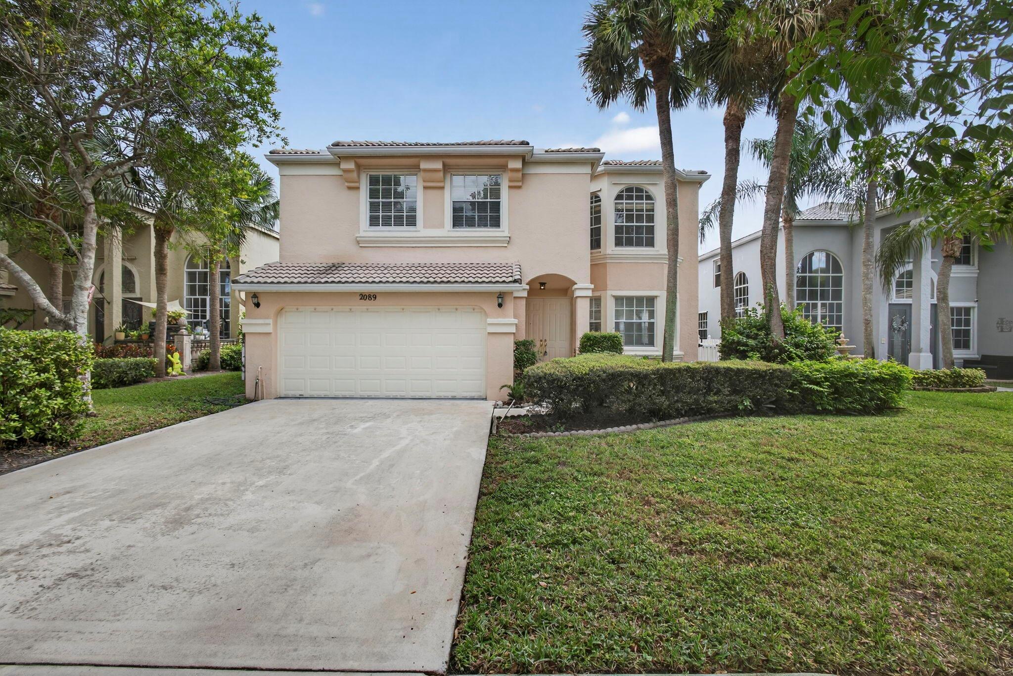 Beautiful two story 5 bedroom home with over 3038 sf overlooking M1 Canal in the gated community of Madison Green. high ceilings, NEW porcelain tiles for ground floor and new laminate wood for 2nd floor . The entire house has been painted like new, with modern LED lighting. French Doors; Huge fenced backyard and you can dock your boat in the deep canal in the backyard. This Community includes golf, resort style clubhouse, state of the art fitness center, tennis ,pickleball, basketball courts, children' playground, kids pool with fountain, resort pool and spa. Close to A rated schools, and a short drive to to PBIA airport, downtown West Palm Beach and Wellington Green Mall. The Links at Madison Green offers daily greens fees and no equity required. Preferred Basic cable & internet