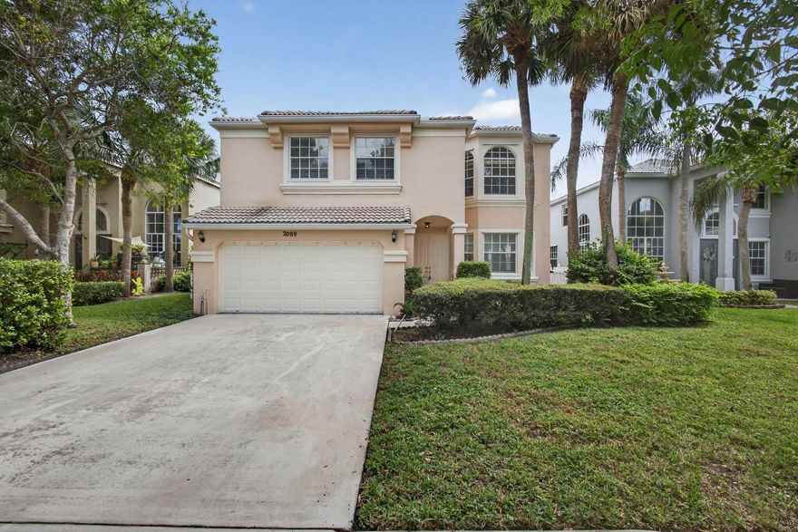 Beautiful two story 5 bedroom home with over 3038 sf overlooking M1 Canal in the gated community of Madison Green. high ceilings, NEW porcelain tiles for ground floor and new laminate wood for 2nd floor . The entire house has been painted like new, with modern LED lighting. French Doors; Huge fenced backyard and you can dock your boat in the deep canal in the backyard. This Community includes golf, resort style clubhouse, state of the art fitness center, tennis ,pickleball, basketball courts, children' playground, kids pool with fountain, resort pool and spa. Close to A rated schools, and a short drive to to PBIA airport, downtown West Palm Beach and Wellington Green Mall. The Links at Madison Green offers daily greens fees and no equity required. Preferred Basic cable & internet