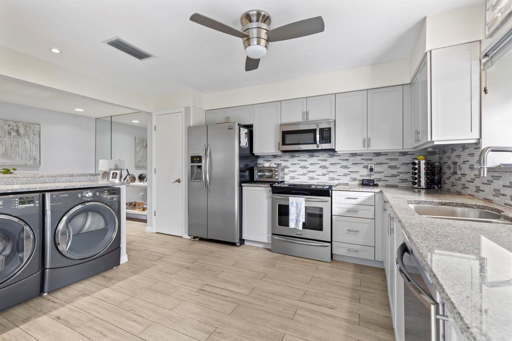 Photo of 2619 SW Westlake Circle, Palm City, FL 34990 (MLS # R11097577)