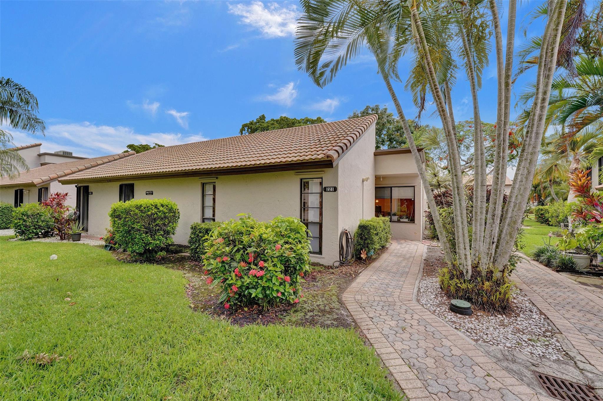 Rarely available corner unit located in the desired community of The Trellises in Jacaranda Country Club. Great open floor plan. Vaulted ceilings! 2 Master Suites! Updated kitchen with wood cabinets. Snack counter. Formal Living and Dining room plus Florida room. Split bedroom plan. All done in neutral decor. Newer A/C. Neat and Clean and ready to move in. Golf course community with lots of amenities. Clubhouse, Pool, Tennis courts, Gym, Game Room and Sauna. Two pets welcome no more than 35lbs.