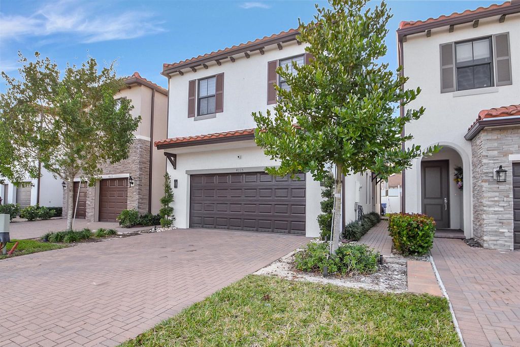 Photo of 4015 Screw Pine Cove, Riviera Beach, FL 33410 (MLS # R10951205)