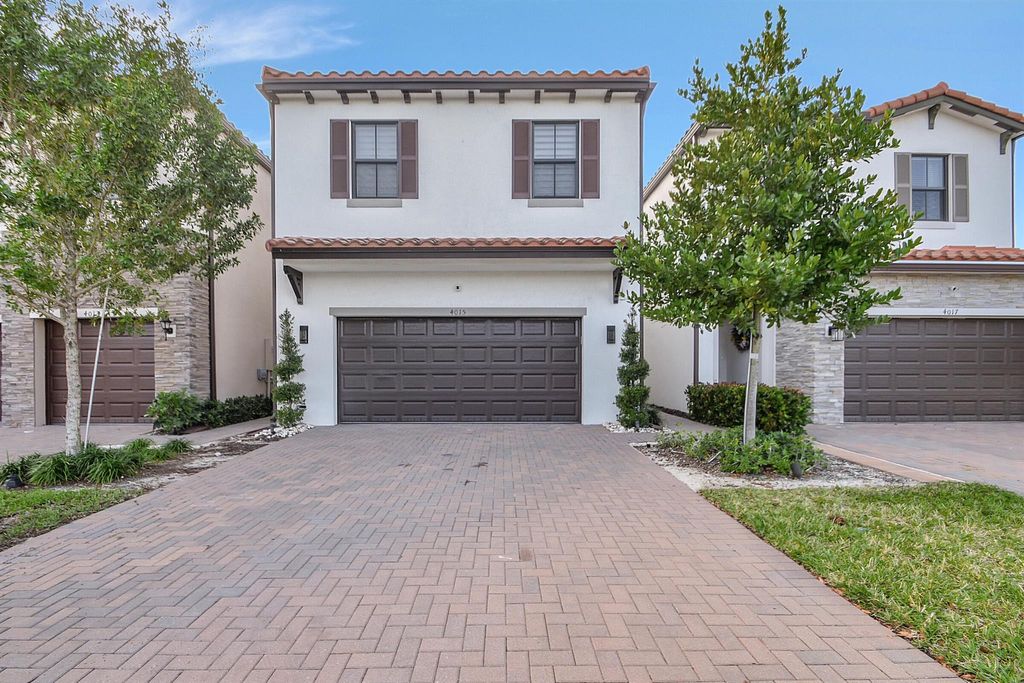 Photo of 4015 Screw Pine Cove, Riviera Beach, FL 33410 (MLS # R10951205)