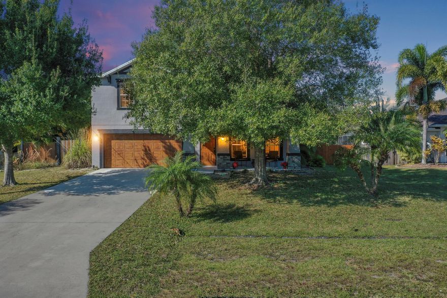 Stunning, fully renovated 4 possible 5-bedroom, 3-bath two-story residence set on an oversized lot with a resort-style pool and serene preserve views. Originally built in 2009, this exceptional home was thoughtfully upgraded in 2024-2025 with a new roof, water heater, pool pump, dual A/C systems, all-new premium appliances, designer flooring, and fresh interior and exterior paint. The expansive open-concept layout is enhanced by modern finishes and abundant natural light. Enjoy unmatched privacy with no rear neighbors, backing directly to a protected preserve. Ideally located in highly desirable Southbend neighborhood near I-95 and the Turnpike, this move-in-ready home offers refined living with major systems already replaced for ultimate peace of mind.