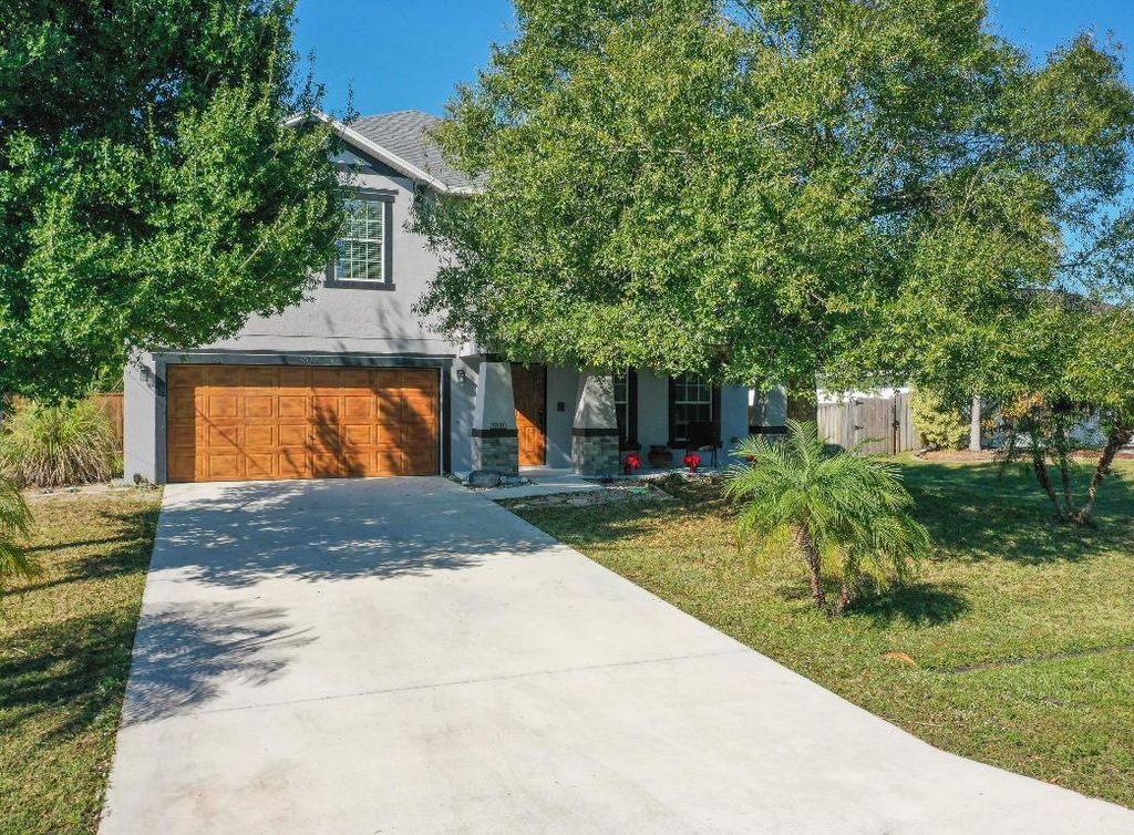 Photo of 3010 SE Wake Road, Port Saint Lucie, FL 34984 (MLS # R11145980)