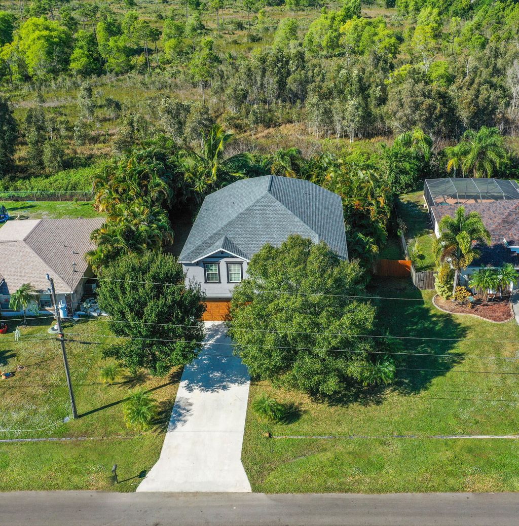 Photo of 3010 SE Wake Road, Port Saint Lucie, FL 34984 (MLS # R11145980)