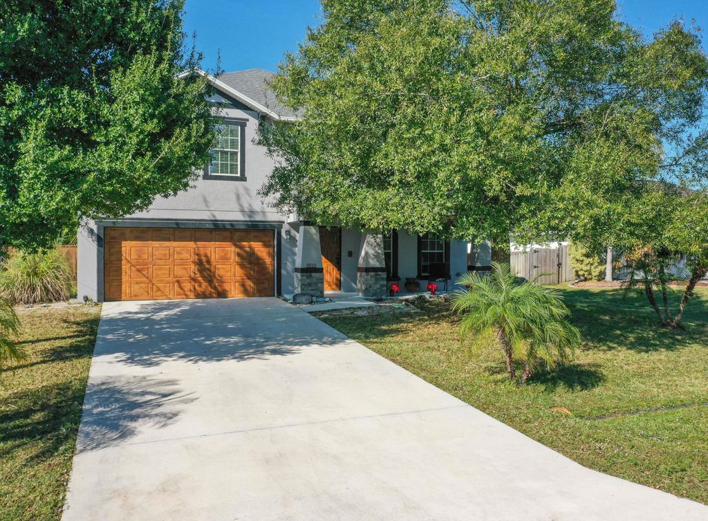 Photo of 3010 SE Wake Road, Port Saint Lucie, FL 34984 (MLS # R11145980)