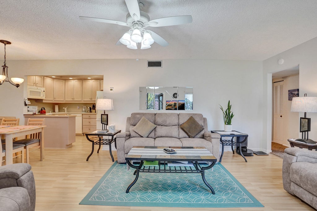 Photo of 3561 Tall Pine Way #B-1, Greenacres, FL 33463 (MLS # B26081595)
